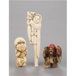 A group of three netsuke.