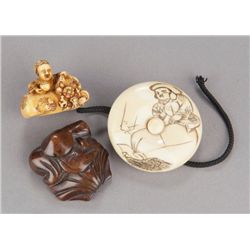 A group of three netsuke of Daikoku.