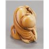 Image 10 : A group of three netsuke.