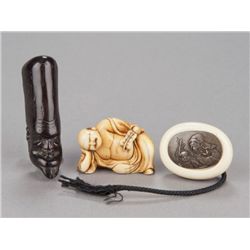 A group of three netsuke.
