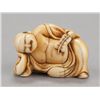 Image 9 : A group of three netsuke.