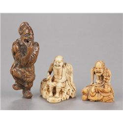 A group of three netsuke of Sennin.