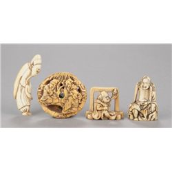 A group of four ivory netsuke.