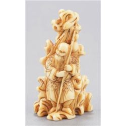 An ivory netsuke of a Sennin.