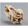 Image 10 : A group of two ivory netsuke of oni.