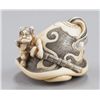 Image 5 : A group of two ivory netsuke of oni.