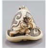 Image 6 : A group of two ivory netsuke of oni.