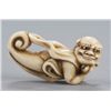 Image 9 : A group of two ivory netsuke of oni.