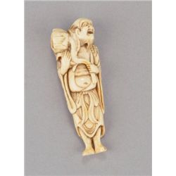 An ivory netsuke of a Sennin with spirit in lotus