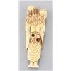 Image 2 : An ivory netsuke of a Sennin with spirit in lotus