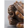 Image 5 : A wood netsuke of an oni.