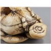Image 9 : A group of two ivory netsuke.