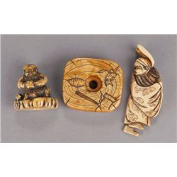 A group of three ivory netsuke.