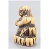 Image 3 : A group of three ivory netsuke.