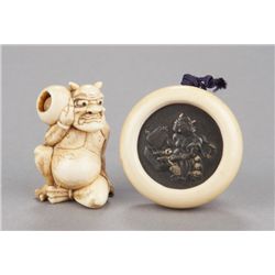 A group of two ivory netsuke.