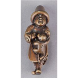 A boxwood netsuke of a Dutchman.