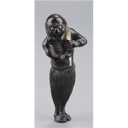 An ebony netsuke of a South Sea Islander.