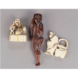 A group of three netsuke.