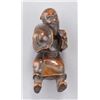 Image 1 : A wood netsuke of a Mongolian man.