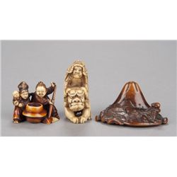 A group of three netsuke.