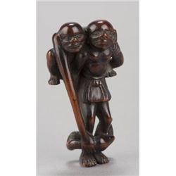 A wood netsuke of Ashinaga and Tenaga.
