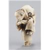 Image 6 : A group of four netsuke, various materials.