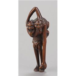 A wood netsuke of Ashinaga and Tenaga.