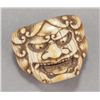 Image 2 : A group of four mask netsuke.