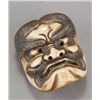 Image 6 : A group of four mask netsuke.