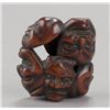 Image 2 : A group of four mask netsuke.