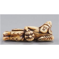 An ivory netsuke of a Gigaku dancer.
