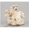 Image 2 : A group of two ivory netsuke.