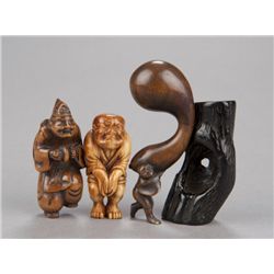 A group of four netsuke, various materials.