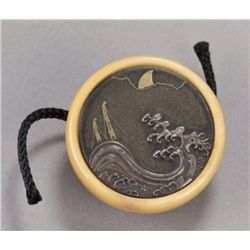 An ivory & shibuichi kagamibuta of masts.