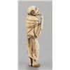 Image 2 : An ivory netsuke of a man.