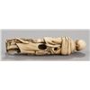 Image 4 : An ivory netsuke of a man.