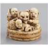 Image 2 : A group of four netsuke, various materials.