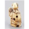 Image 9 : A group of four netsuke, various materials.