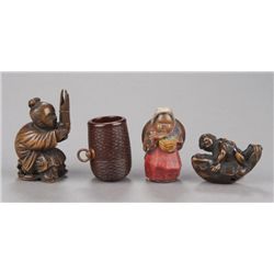 A group of four wood netsuke.