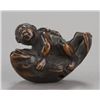 Image 3 : A group of four wood netsuke.