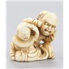 Image 7 : A group of three netsuke, various materials.