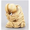Image 9 : A group of three netsuke, various materials.