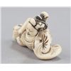 Image 3 : A group of two netsuke, various materials.