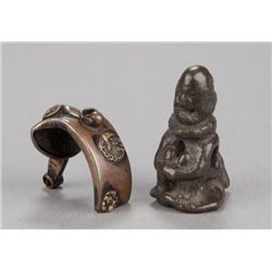 A group of two metal netsuke.