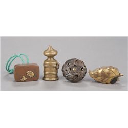 A group of four netsuke, various materials.