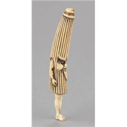 A stag antler netsuke of an umbrella ghost.