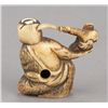 Image 10 : A group of four stag antler netsuke.