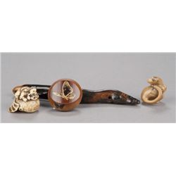 A group of four netsuke, various materials.