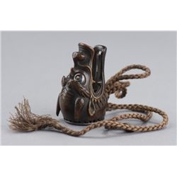 A rhino horn netsuke of a dragon head.  - ash tray