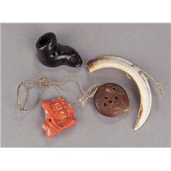 A group of four netsuke, various materials.